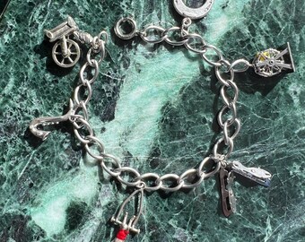 Vintage Sterling Silver Charm Bracelet With Articulated And Enameled Charms