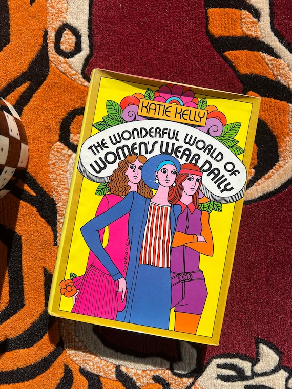 1970's First Edition "The Wonderful World Of Women's Wear Daily" Book With Colorful Cover