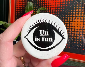 1970's "Un Is Fun" Eye Button By The Seven Up Co