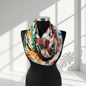 May include: A set of three ceramic mugs with a speckled, matte finish. The mugs are in shades of cream, light gray, and dark gray. Each mug has a simple, minimalist design and a rounded handle.