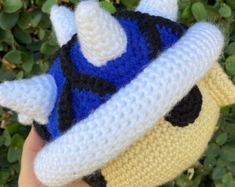 Modello all'uncinetto con conchiglia blu