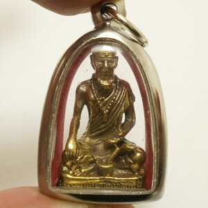Ruesri Cheevaka Brass Amulet: Thai Healing Talisman