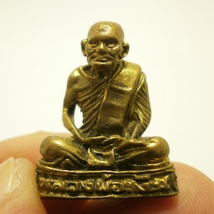 LP Ngern Brass Amulet: Thai Buddha Wealth Statue (1.8x2.5cm)
