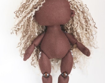 Cloth dark skinned doll body with hair