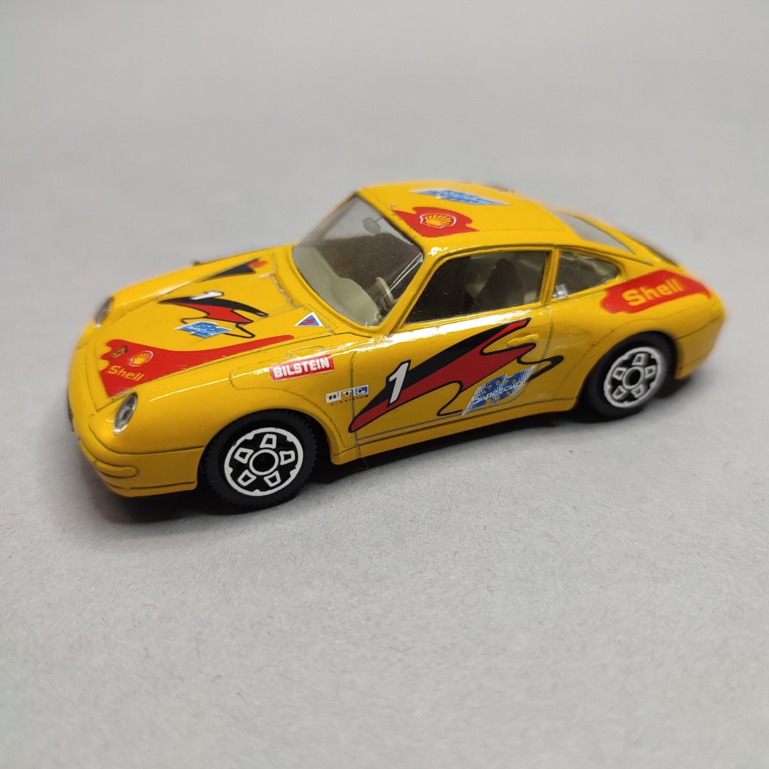 burago  ポルシェ911 カレラレーシング Amazon | ブラーゴ 1/18 ポルシェ 911 カレラ レーシング 1993