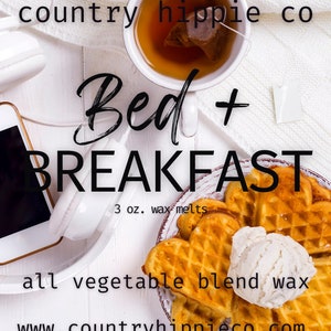 May include: A white plate with heart-shaped waffles, a scoop of vanilla ice cream, and a cup of tea. The text "Bed + Breakfast" is written in black on a white background. The text "3 oz. wax melts" is written in black on a white background. The text "all vegetable blend wax" is written in black on a white background. The text "www.countryhippieco.com" is written in black on a white background.
