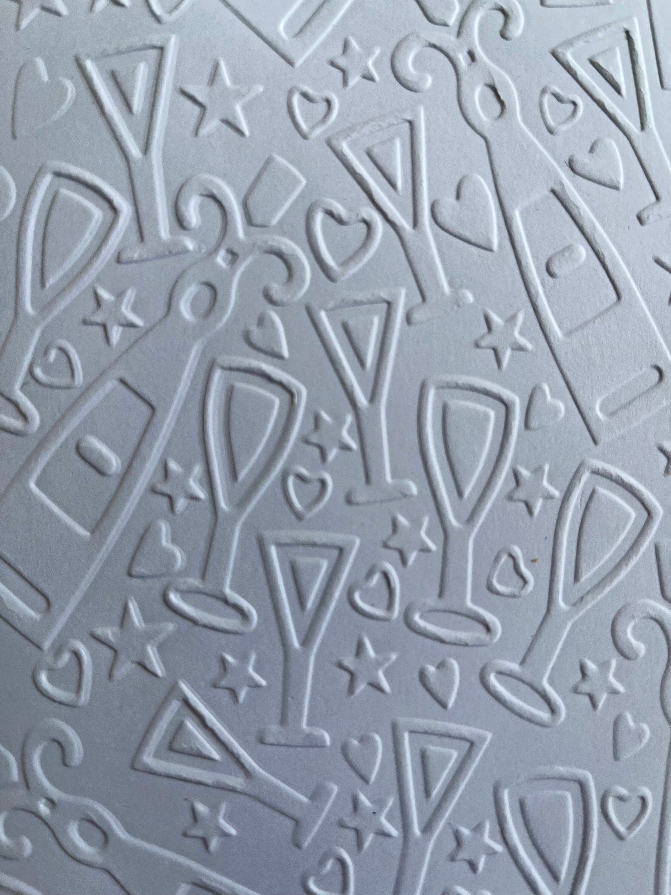 6 Hand-Embossed Celebration White Notecards. Made in Michigan.