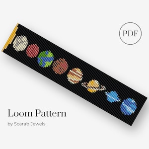 May include: A loom pattern for a beaded bracelet featuring a black background with a row of planets in different colors, including white, red, blue, green, orange, yellow, and brown. The text "Loom Pattern" and "by Scarab Jewels" is below the bracelet.
