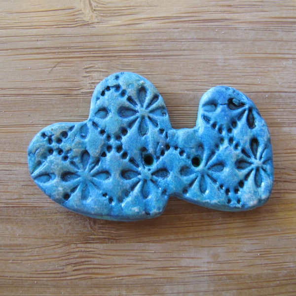 Button (1)Ceramic Textured Button 2" (W) x 1 1/4" (H)" -Double Heart shaped Button-Medium Turquoise with imprinted Floral Pattern