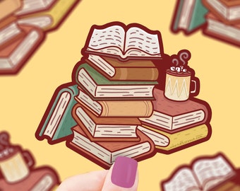 Pegatina de vinilo con diseño de pila de libros: Calcomanía acogedora para portátil con temática de libros.