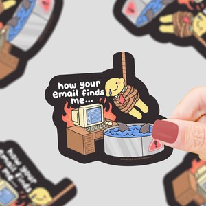 May include: A sticker with a humorous design. It features a cartoon lemon tied up, a computer on fire, and sharks in a pool. The text reads "how your email finds me..." The sticker is held by a hand.
