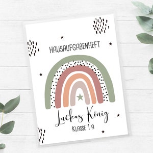 Homework booklet cover personalized with name rainbow