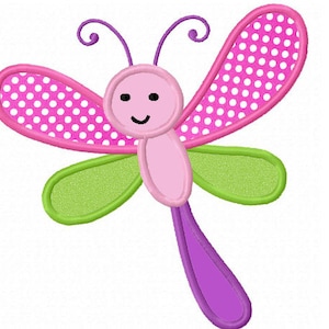 May include: A pink and green dragonfly with white polka dots on its wings. The dragonfly has a purple tail and a smiling face.