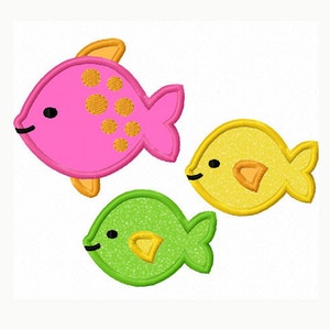 May include: Three cartoon fish with embroidered details. The fish are pink, yellow, and green. The pink fish has orange spots, the yellow fish has an orange fin, and the green fish has a yellow fin.