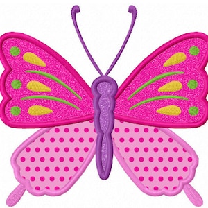 May include: A pink butterfly with green and yellow accents and a polka dot pattern on the wings.