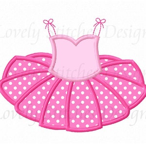 May include: Pink tutu with white polka dots and pink straps. The tutu is a popular costume for girls.