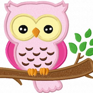 May include: A cartoon owl illustration in shades of pink, with yellow eyes and an orange beak. The owl is perched on a brown branch with green leaves. The design has a stitched appearance, suggesting an embroidery or applique.