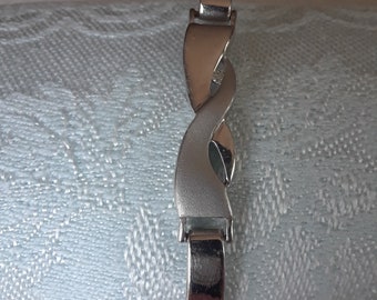 Stainless Stell Bangle Bracelet with a Diamond Chip / Fits a small 7 in. wrist
