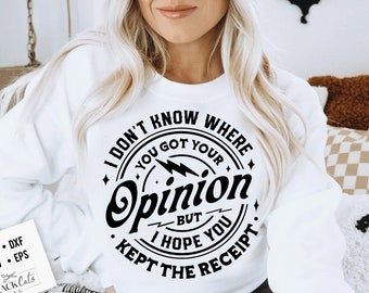 May include: White sweatshirt with a black circle graphic that says "I don't know where you got your opinion but I hope you kept the receipt."
