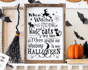 May include: A black and white sign with the text "When Witches Go Riding and Black Cats Are Seen The Moon Laughs and Whispers 'Tis Near Halloween". The sign is framed in wood and has a black witch and cat silhouette.