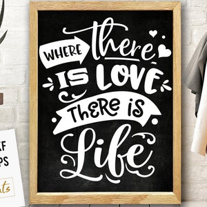 May include: Black and white chalkboard sign with the text "Where there is love there is life".