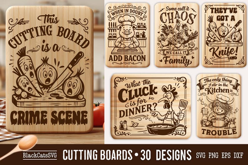 May include: A collection of wooden cutting boards with humorous kitchen-themed designs. One board features a knife, carrots, and onions with the text "This Cutting Board is a Crime Scene." Other boards have cartoon illustrations and text.