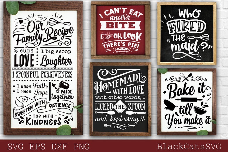 May include: A collection of framed kitchen signs with white text on various colored backgrounds. The signs feature phrases like "Our Family Recipe," "I Can't Eat Another Bite," and "Bake it till You Make it." The signs are in wooden frames.