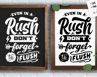 May include: Two black framed signs with white text that reads "Even in a rush, don't forget to flush".