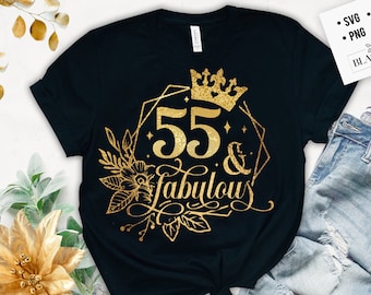 May include: A black t-shirt with a gold design that says "55 & fabulous" with a crown and floral accents.