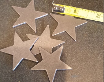 20 1.5" Decorative Metal Stars Sizes 1.5" -  2" steel stars.  20 blank/unfinished steel stars