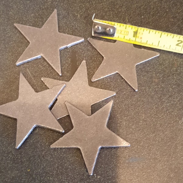 20 1.5" Decorative Metal Stars Sizes 1.5" -  2" steel stars.  20 blank/unfinished steel stars