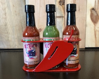 Hot sauce gift package and display caddy comes with 3 bottles of El Toro hotsauce 3 different flavors hotsauce gift pack