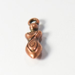 bulk jewelry charms in antique copper featuring strong woman in boho style for necklaces and bracelets