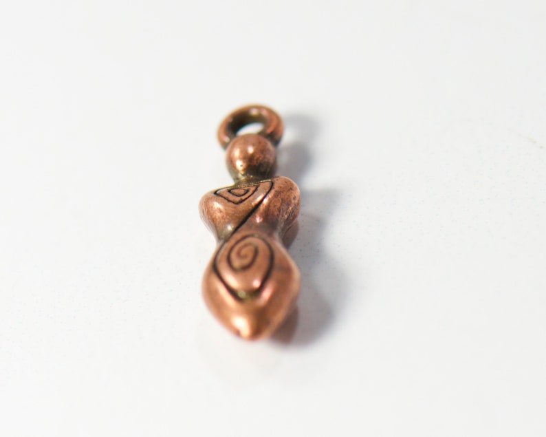 bulk jewelry charms in antique copper featuring strong woman in boho style for necklaces and bracelets