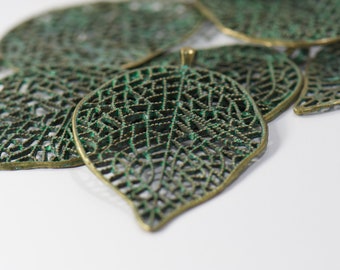 Brass Patina Green Leafy Scroll Design in a Large Pendant by Zola Elements for jewelry making crafts and projects. Gold Accents. Boho Style