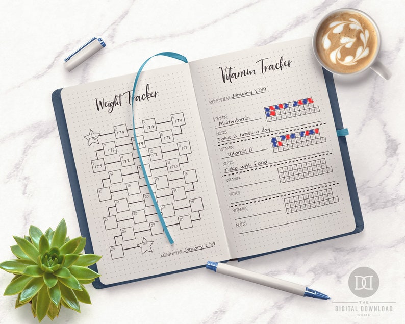 May include: A weight tracker and vitamin tracker spread in a bullet journal. The weight tracker has a grid with numbers from 170 to 179. The vitamin tracker has a grid for tracking daily intake of multivitamins and vitamin D. The text "January 2019" is written at the top of the page.