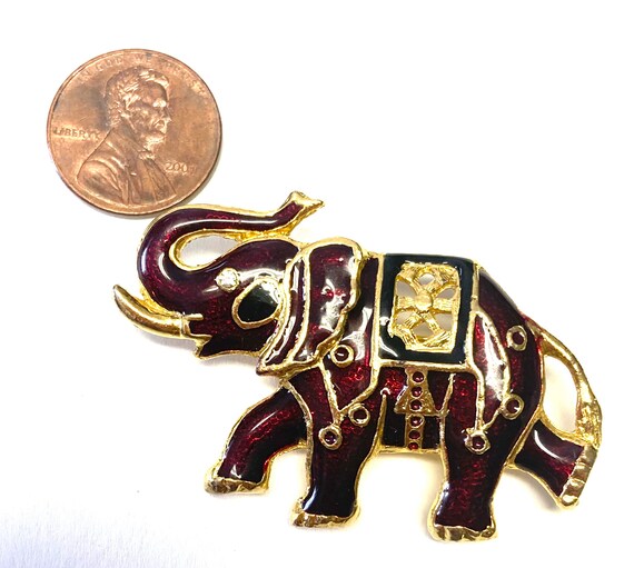 1980s elephant-shaped brooch with black varnish and rhinestones main image 0