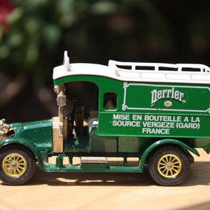 Matchbox Models of YesterYear Perrier Truck - 1983 Renault Die Cast Toy - Collectible Promotional Truck