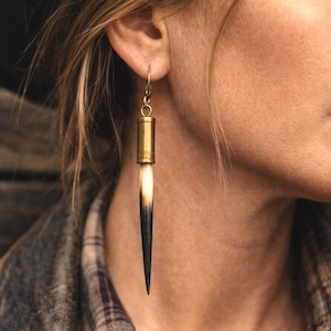 May include: A handmade wooden sign with the text "Welcome" in a playful font. The sign is painted white with a distressed finish, and features a small, decorative heart. It's designed for indoor or outdoor use.