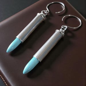 Spike .22 Kaliber Winchester Magnum Shell Turkos Howlit Kulörhängen