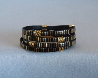 5mm Black and Gold Striped  Leather with Gold Pinch Beads Wrap Bracelet