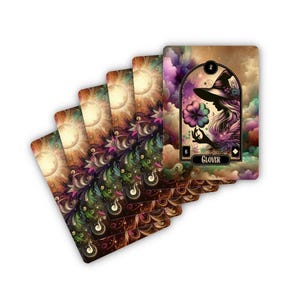 May include: A set of playing cards with a colorful, whimsical design. The cards feature a silhouette of a witch holding a four-leaf clover. The card shown is the 2 of Diamonds, with the word "GLOVER" printed on it.
