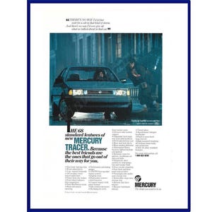 MERCURY TRACER AUTOMOBILE Original 1987 Vintage Print Advertisement "The 68 Standard Features Of New Mercury Tracer." Stormy Weather Scene