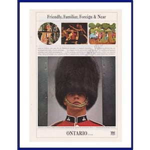 May include: A vintage advertisement for Ontario, Canada, featuring a photo of a man in a red uniform and a large black bearskin hat. The text reads "Friendly, Familiar, Foreign & Near" and "Ontario".