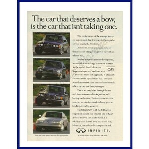 INFINITI Q45 AUTOMOBILE Original 1992 Vintage Color Print Anuncio &quot;El coche que merece un arco, es el coche que no está tomando uno.&quot;