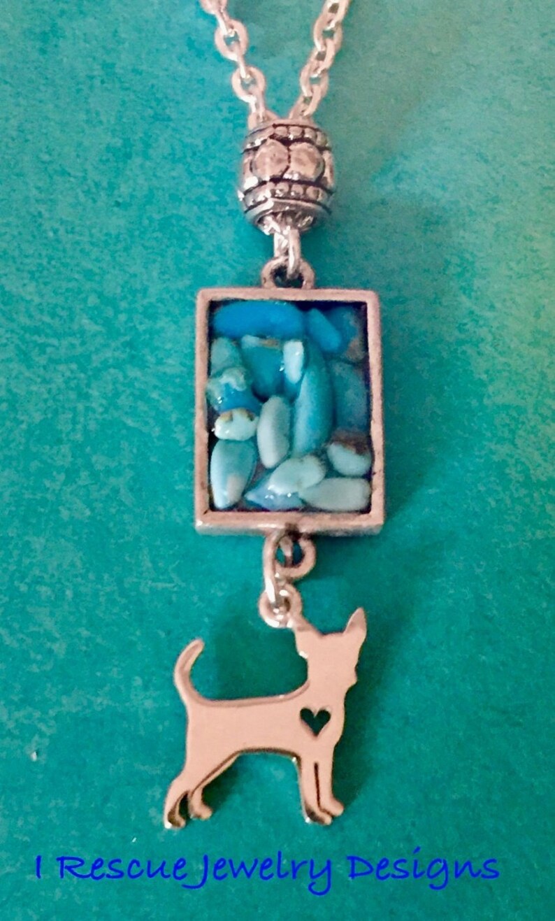 Sleeping Beauty Turquoise chips set in a silver pendant with a sterling chihuahua charm on silver chain NNP042