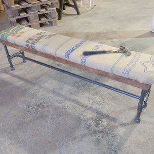 Reclaimed Burlap Coffee Sack Bench on thick wooden Plank w/ Black Iron Pipe Base