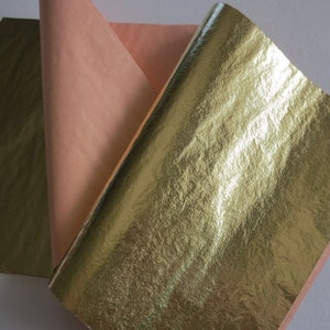 3 boeken van 25 metallic goudkleurige bladeren (75 in totaal), 5,5 "x 5,5" elk met papier interleaving.