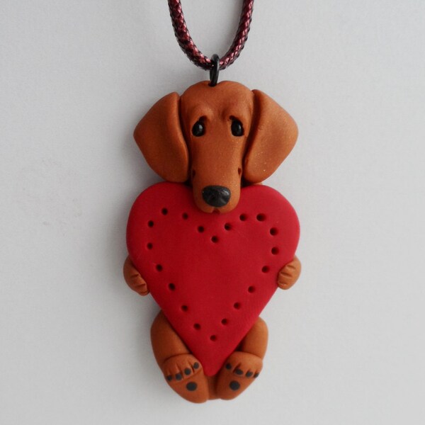 Dachshund holding Heart Necklace hand sculpted polymer clay Doxie jewelry by Raquel at theWRC