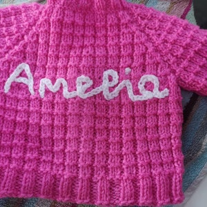 Ainm, Hand-knitted baby cardigan, personalised with your baby's name by me, Irish baby knitwear, embroidered baby cardigan. image 1